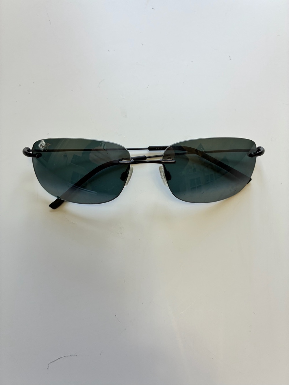 Maui Jim Black Rimless Sunglasses with Dark Gray Lenses